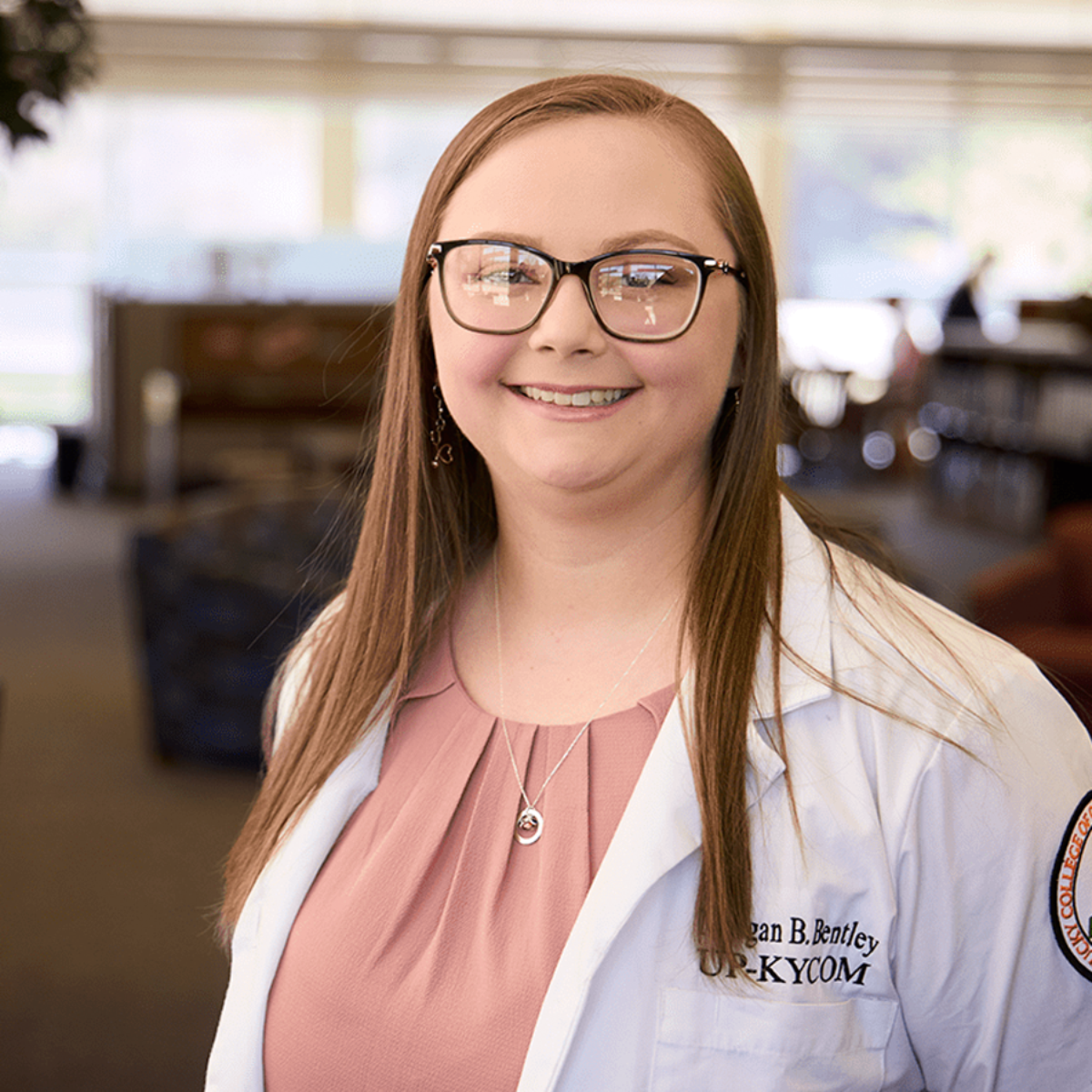 Morgan Riffe, a fourth-year medical student in Appalachian Kentucky, smiles at the camera.