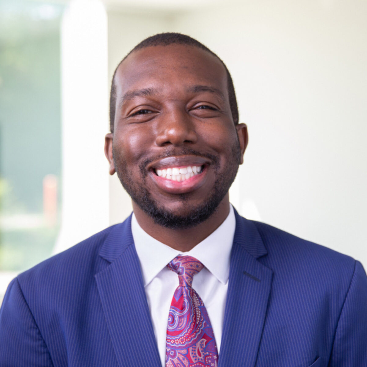 Marquice Clark, principal of the Cleveland Academy of Leadership, smiles at the camera.